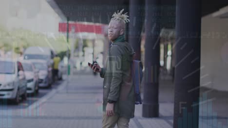 animation of graphs, numbers on african american man with cellphone looking back and walking in city