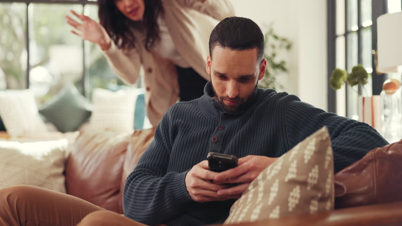 Couple Arguing Over Phone Use
