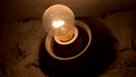 light bulb in basement in 4k slow motion