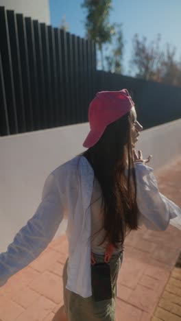 young woman posing outdoors