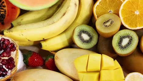 variety of fruits displayed on a white background