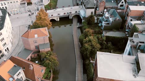 hoogbrug or grootbrug oldest stone bridge in mechelen, belgium - aerial fly-over