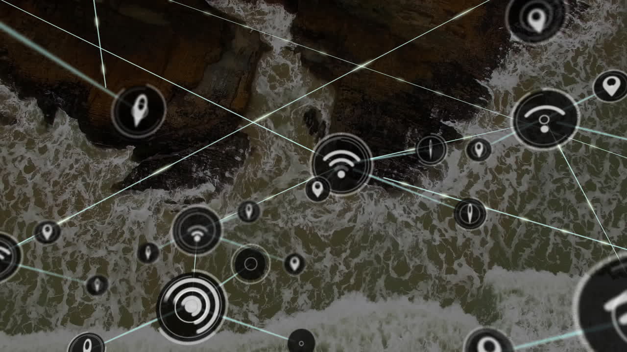 Network connectivity icons and lines animation over aerial view of rocky coastline