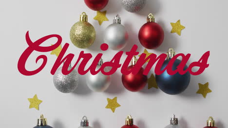 animation of christmas text over christmas decorations
