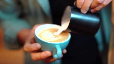 crop male barista preparing coffee