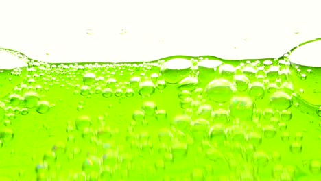 water oil bubbles  behind glass background