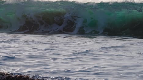 beautiful slow motion slo mo ocean waves crashing and breaking off the sea shore in hawaii