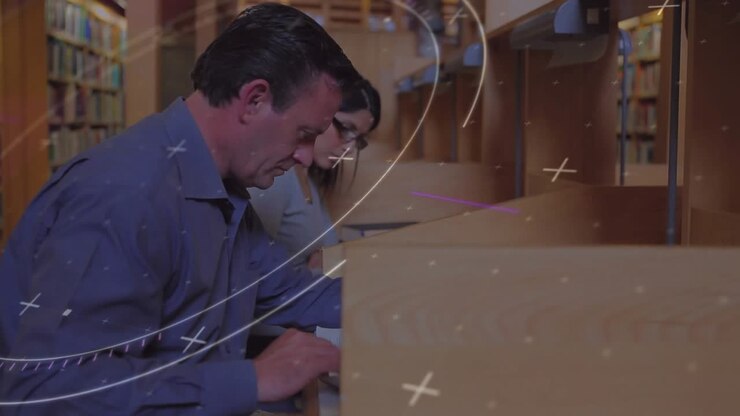 Mature man studying text while woman nodding as curving lines and crosses drifting across library