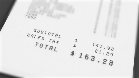 animation of total costs on grocery receipt constantly growing