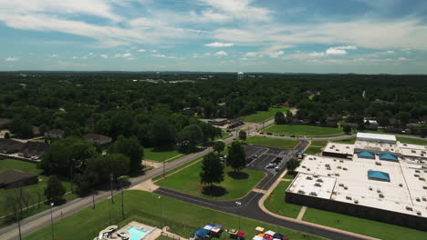 Outdoor-Pools-And-Water-Slide-In-Aquatic-Center-During-Summer-In-Siloam-Springs,-Arkansas