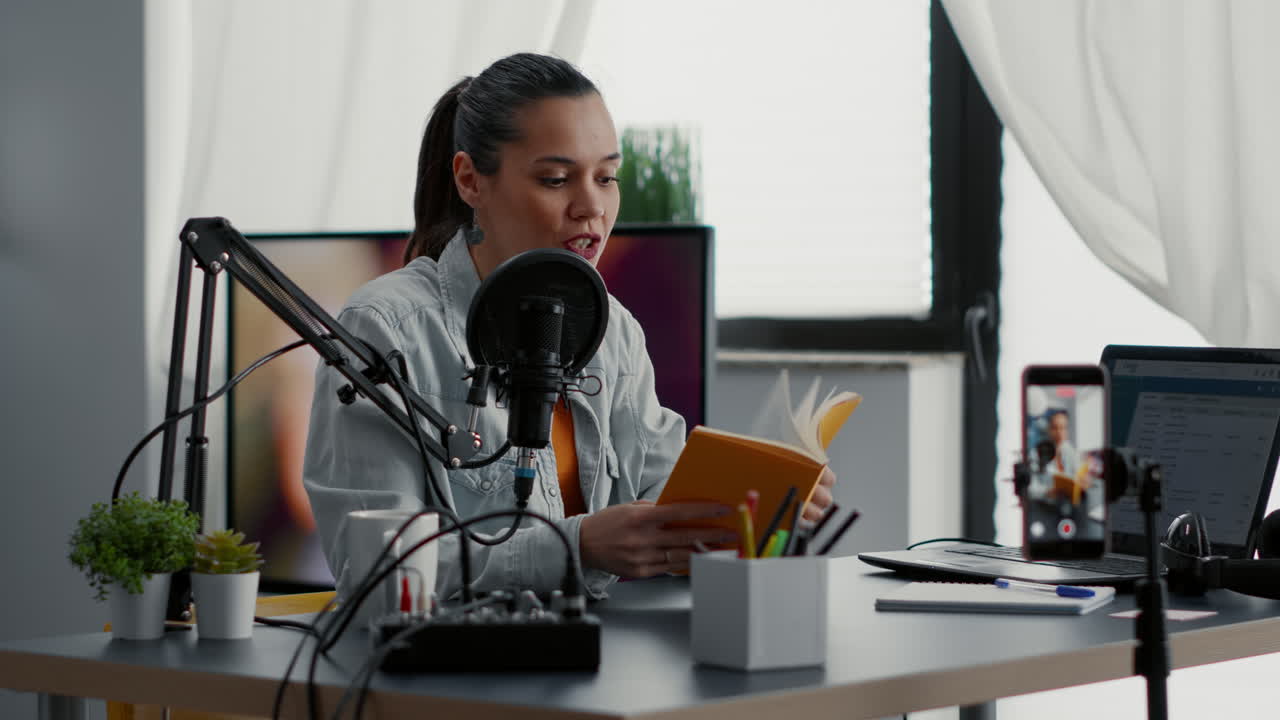 Famous internet influencer filming agenda review while at home in studio