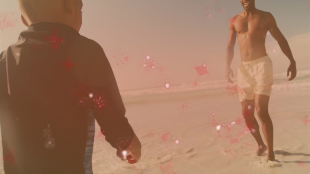 Walking on beach, two people with red glowing animation particles around them