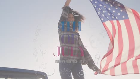 young mixed race woman dancing and holding us flag with independence date foreground