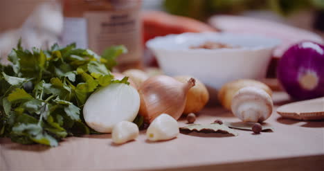 fresh food ingredients on wooden table in kitchen 17