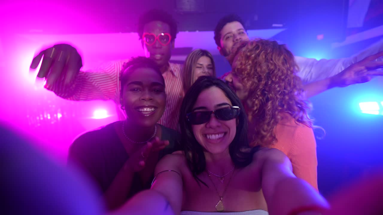A group of friends partying in a nightclub