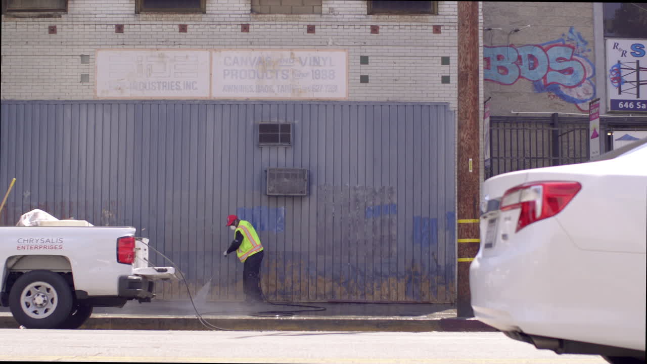 Various vehicles including a car, truck, and van on city streets