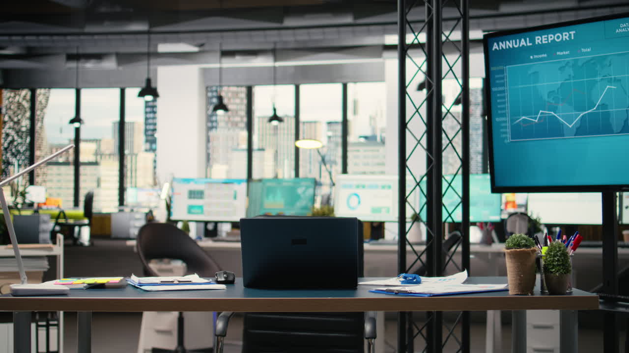 Vertical Video Quiet corporate space equipped with a laptop and performance reports