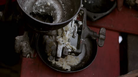 person grinding food