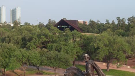 Drone-view-of-the-Sam-Houston-Statue-in-Hermann-Park-in-Houston,-Texas