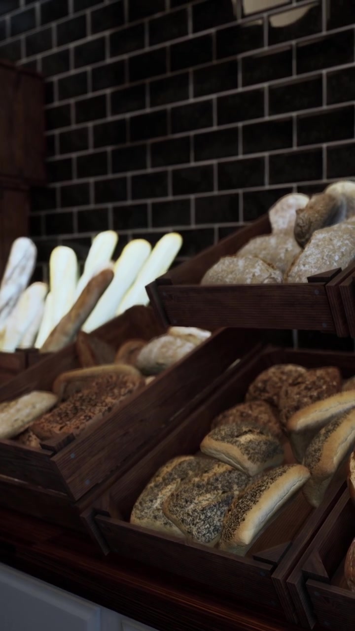 Bakery display with various types of bread at a local shop