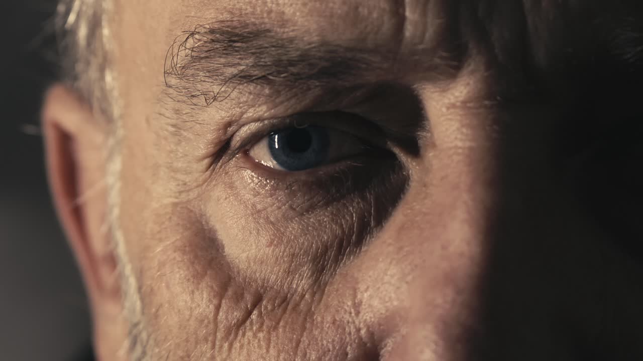 Confused Eye glancing facial expression of Middle aged man close-up