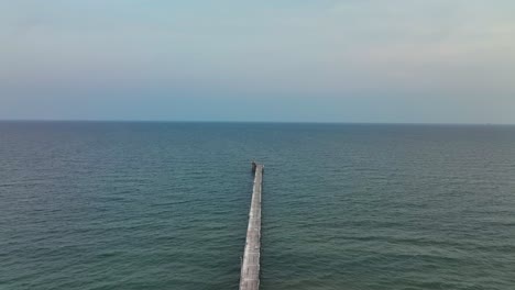 aerial view over bob hall pier on padre island near corpus christi, texas - drone shot