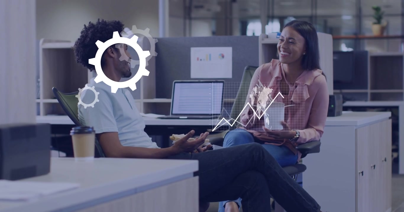 Man gesturing while woman eating and listening, man initiating analytics charts animating over them