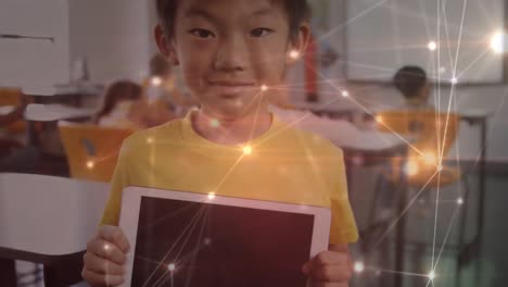 Animation-of-networks-of-connections-over-asian-schoolboy-using-tablet