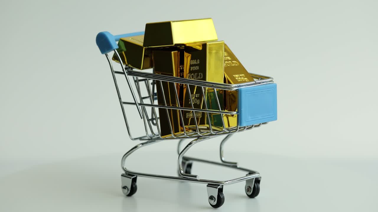 Shopping cart filled with gold bars