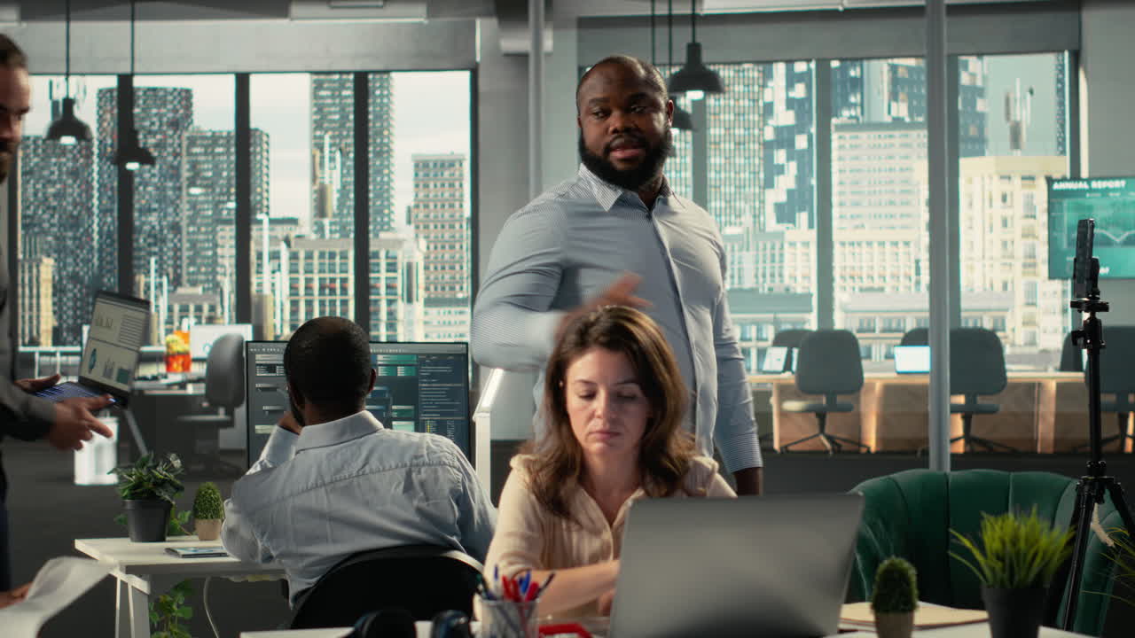 Diverse employee recording marketing ad for web advertisement in office