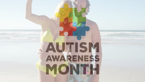 posing on beach, couple with autism awareness month animation in background