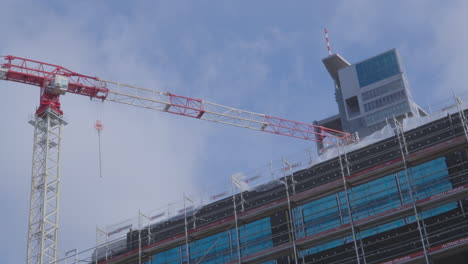 Tower-Crane-And-Scaffoldings-At-Building-Construction-Site-In-Gdynia,-Poland