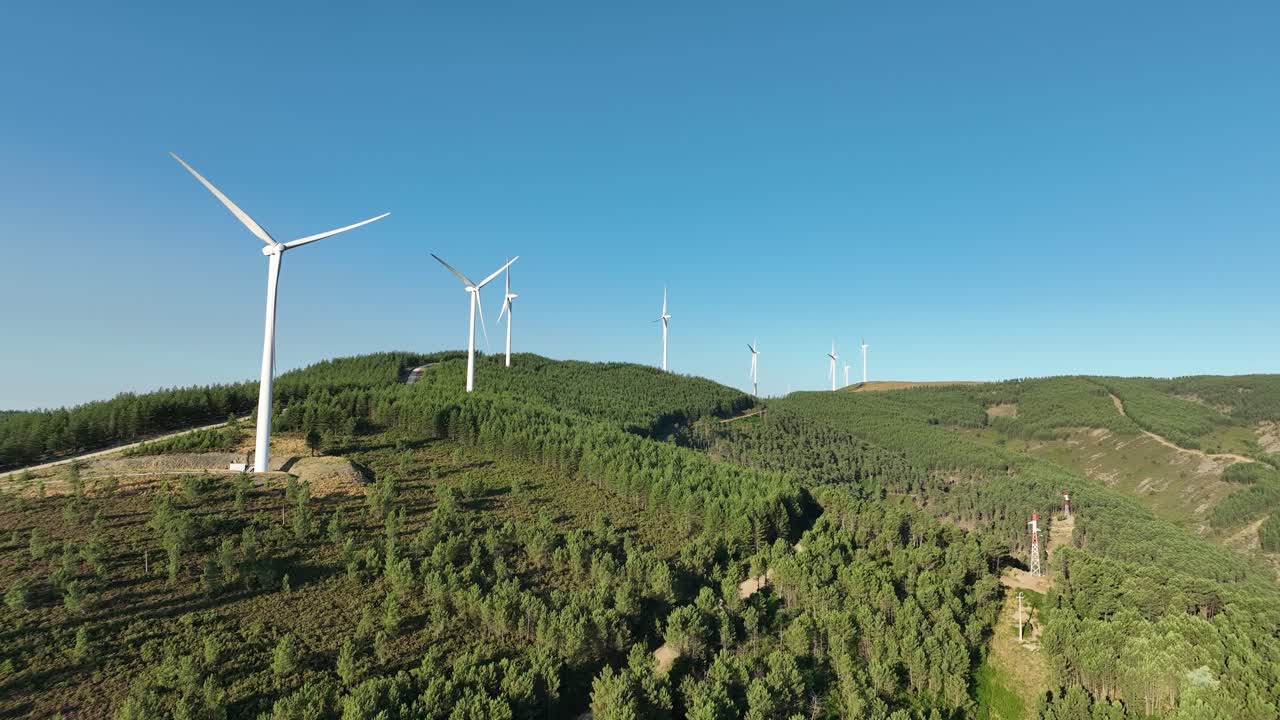 Multiple wind turbines on a hill in Portugal