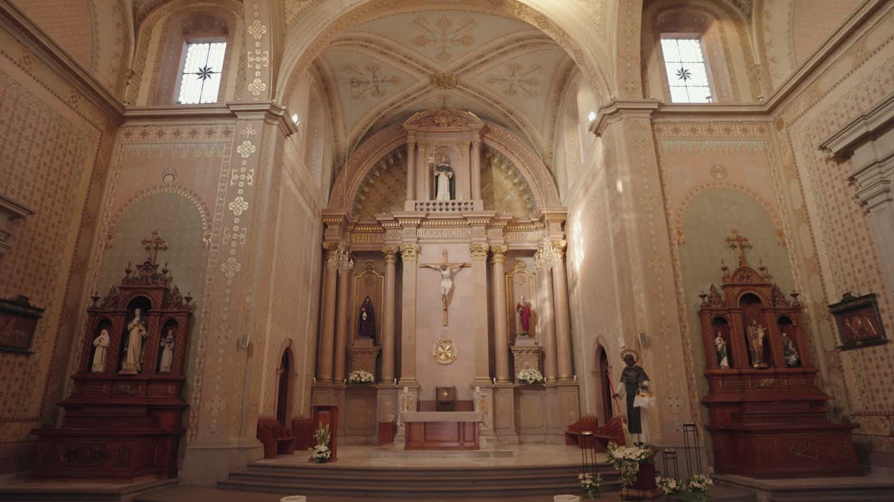 Church interior with altar and religious statues