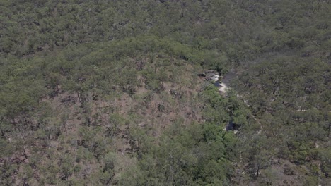 Flying-Over-Flowing-Stream-At-Davies-Creek-Falls---Bare-Hill-Conservation-Park---QLD---North-Queensland---Australia