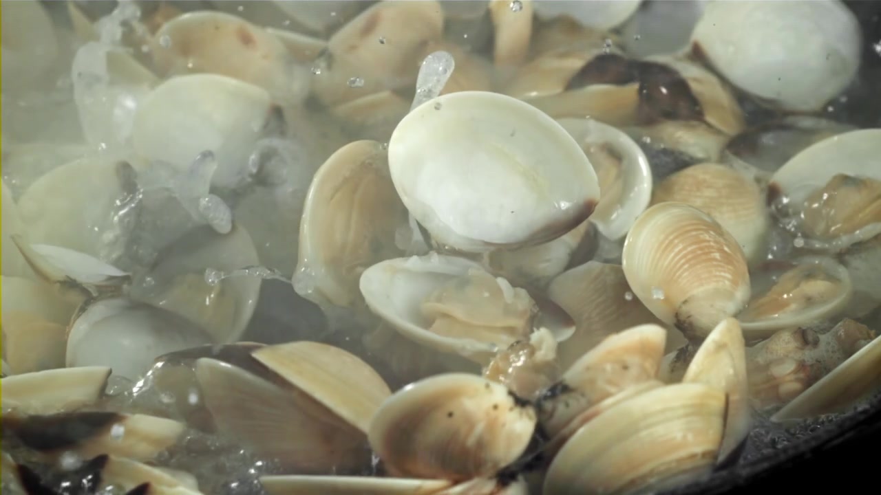 Fresh Clams Opening While Boiling in a Pot