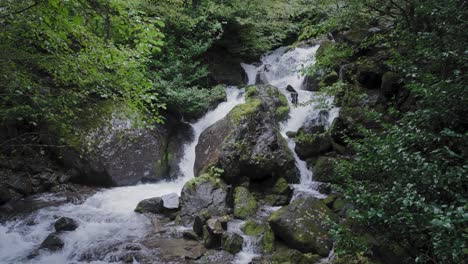 mountain water stream flowing down