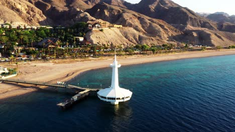 aerial orbit of the underwater observatory marine park in eilat, israel