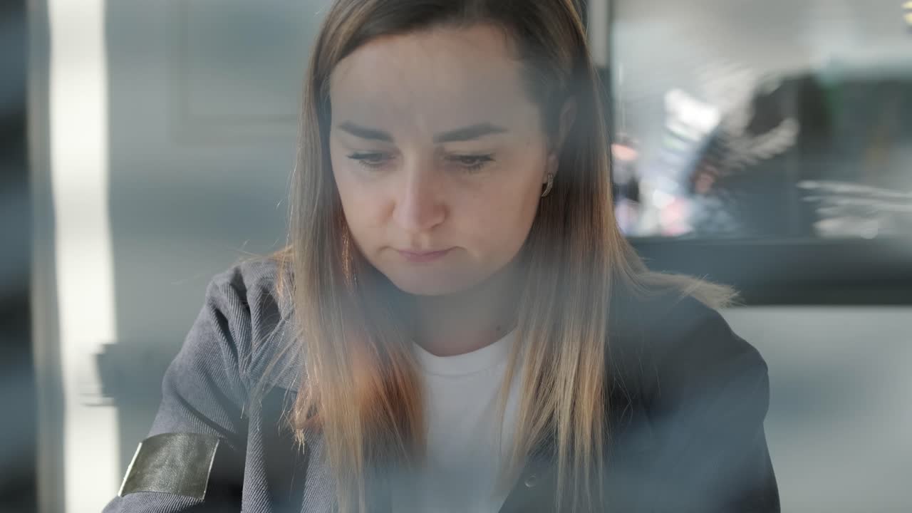 Car Service Manager Working at Desk in Office