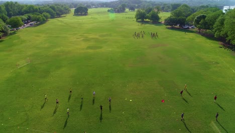 people playing soccer in zikler park in austin, texas