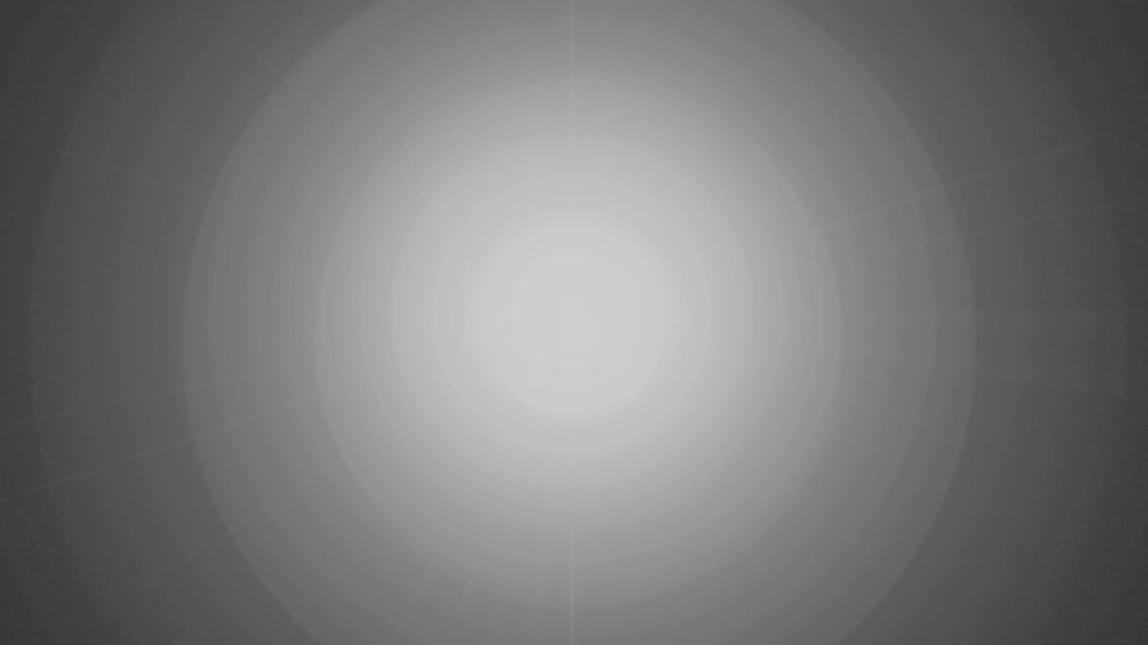 Expanding Bright Light with Concentric Circles Fading to Black