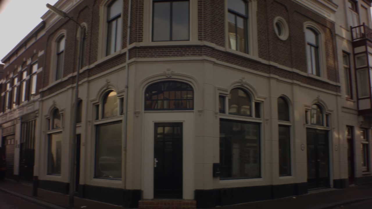 Old Ijmuiden - Netherland - January 21st 2019 : horizontal pane view of classical vintage buildings in dutch neighborhood during winter