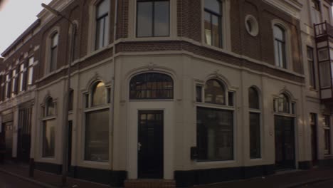 old ijmuiden - netherland - january 21st 2019 : horizontal pane view of classical vintage buildings in dutch neighborhood during winter