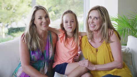 portrait of senior caucasian woman, her daughter and granddaughter