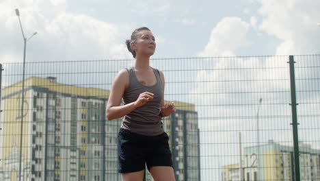 close-up view of asian woman hitting a volleyball