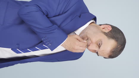 Vertical-video-of-Stressed-businessman-biting-nails.