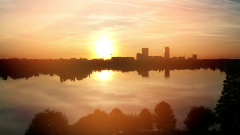 sunset over city lake