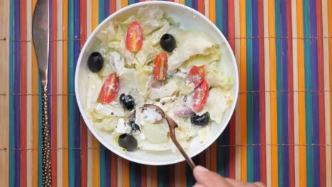 greek salad in a white bowl