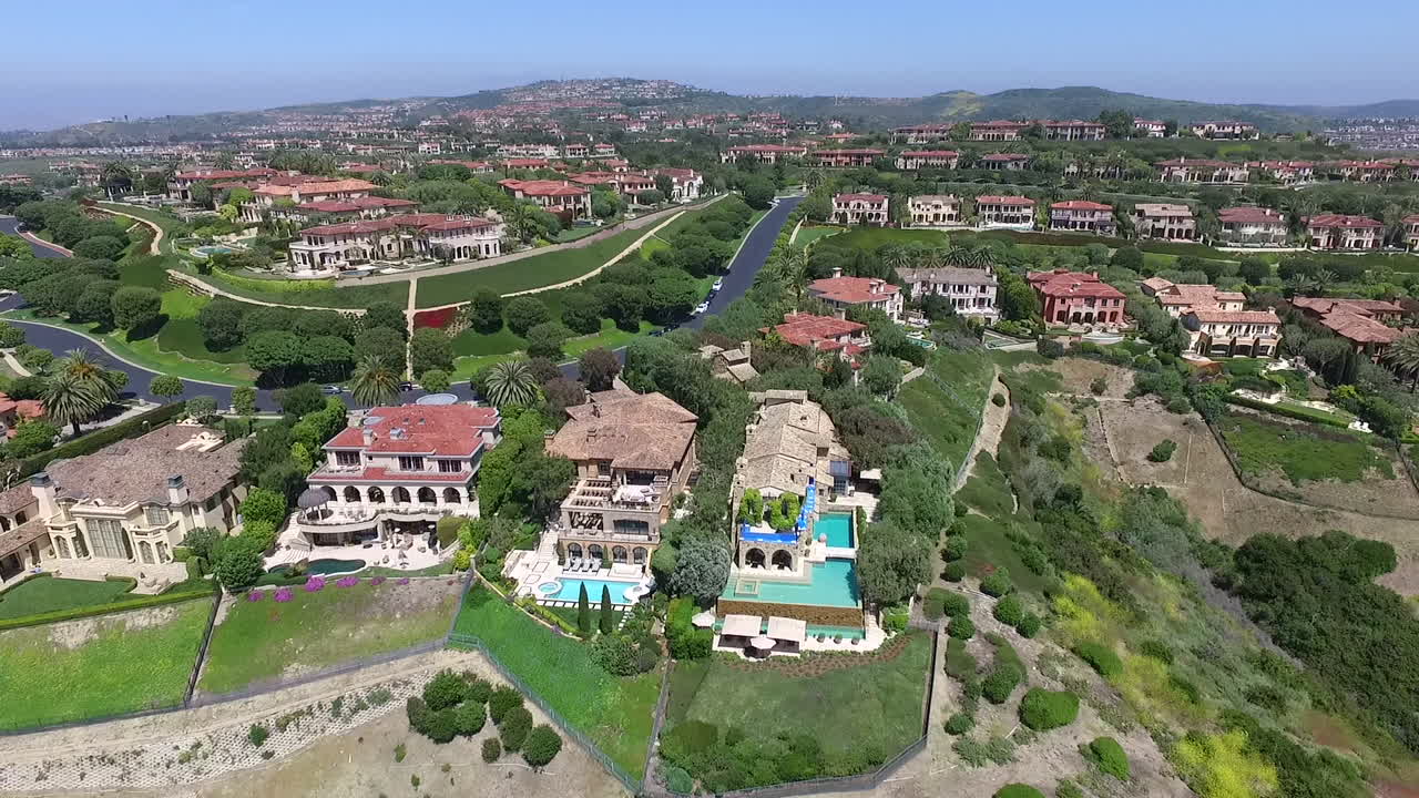 Slow motion aerial drone footage over Pelican Hill in Newport Beach, Orange County, California