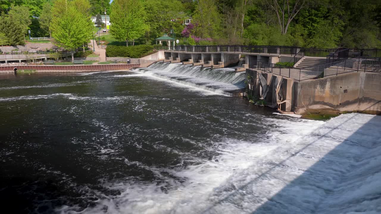 dam in rockford michigan waterfall flowing water